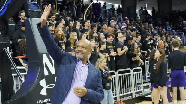 Former Northwestern Wildcats basketball player Billy McKinney is honored at halftime during a halftime ceremony. He is the first athlete to have his jersey retired at the school at Welsh-Ryan Arena.